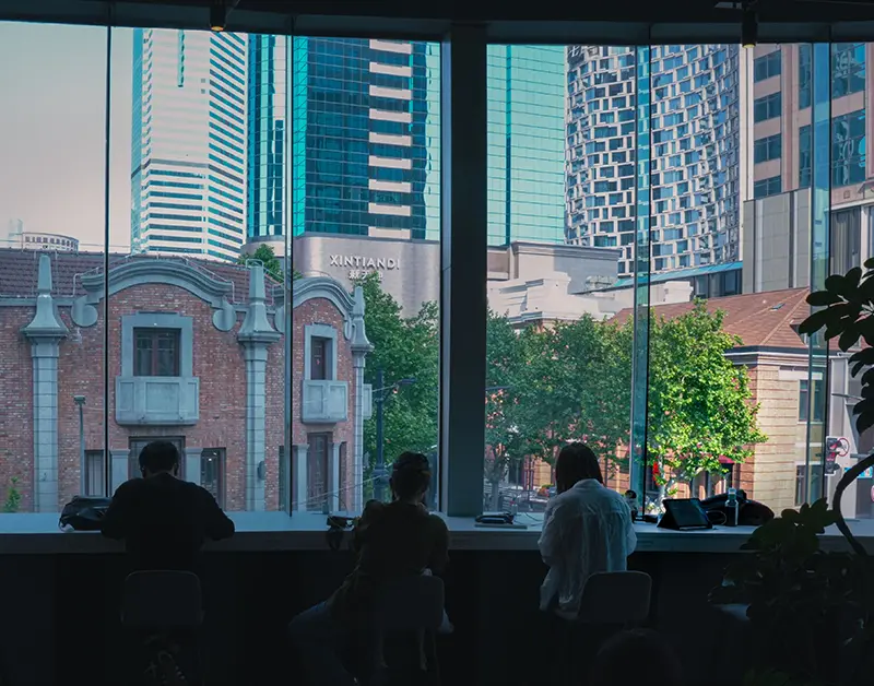 Professionals working remotely in a quiet workspace