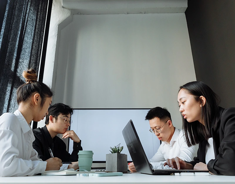 Professionals working in a shared office space