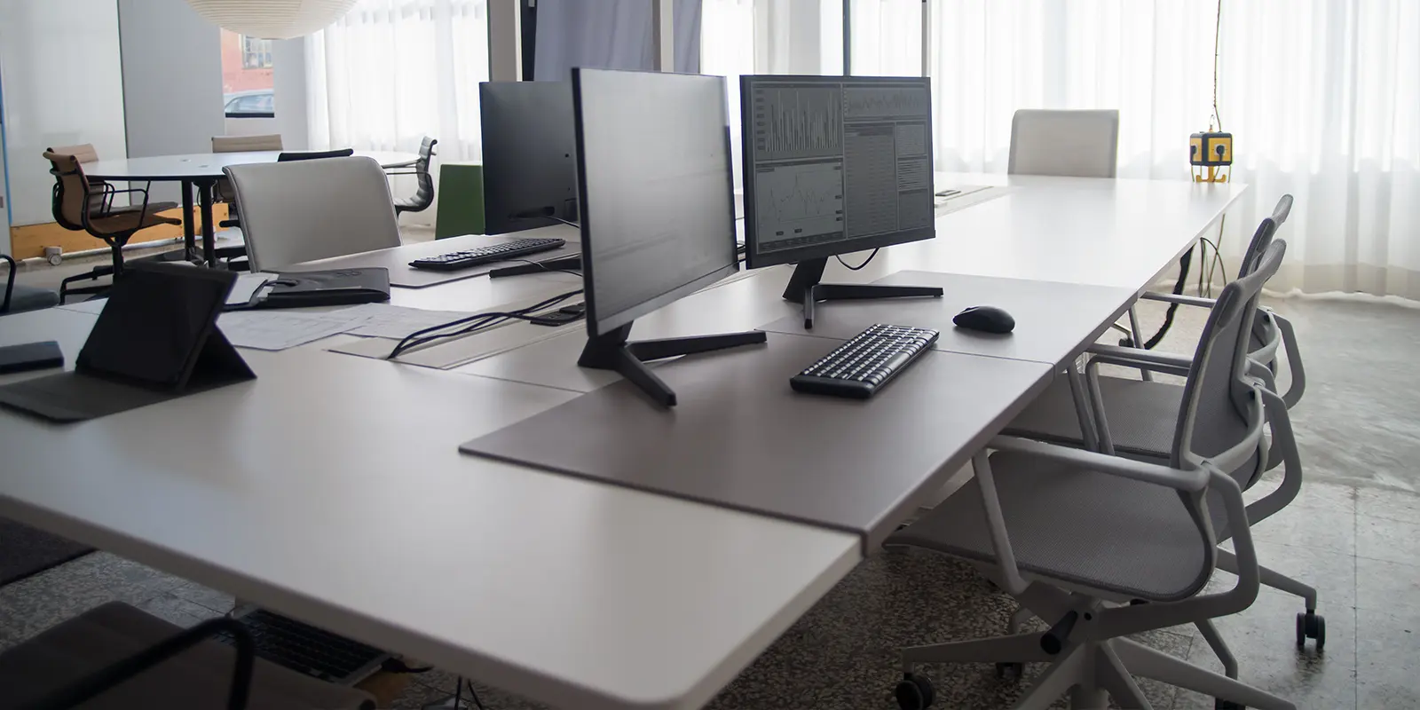 Clean and modern hybrid conference setup with monitors