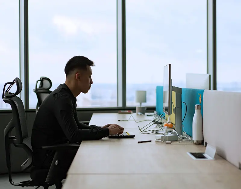 Professional using a secure private office workspace