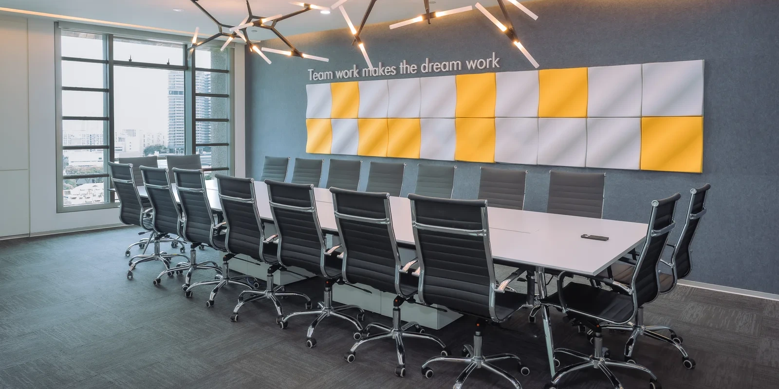 Conference boardroom with yellow accent wall